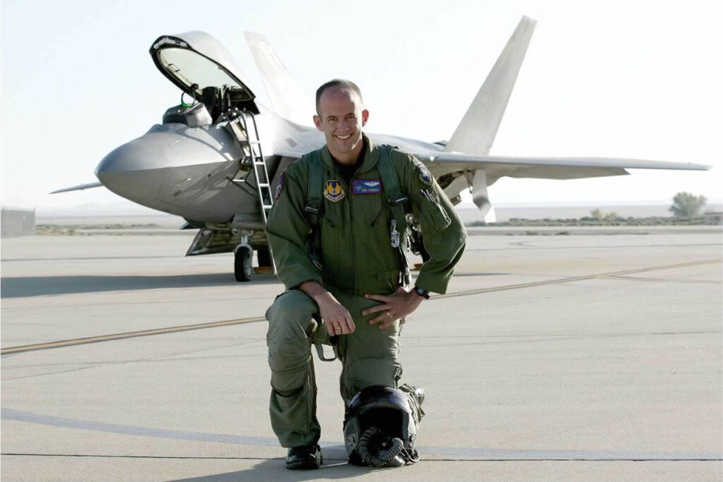 Major John "Dragon" Teichert with the F-22 Raptor